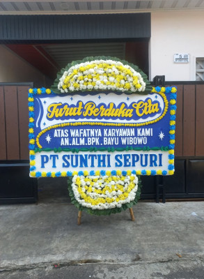 Papan Bunga Duka di Didi