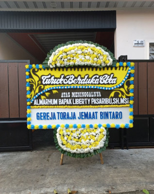 Papan Bunga Duka di Didi